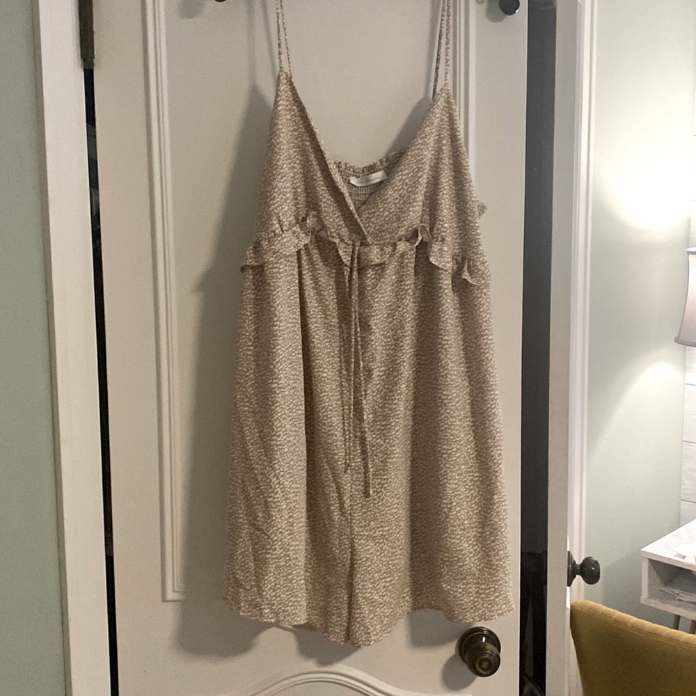 Tan and white romper with ruffle waist